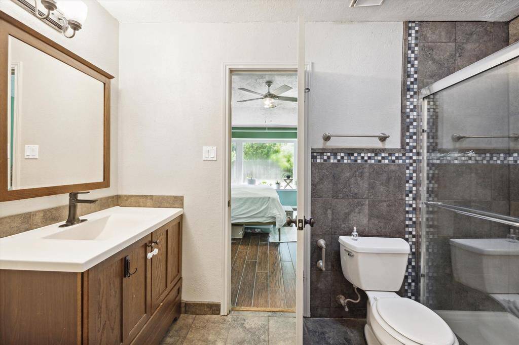 Space and functionality are maximized in the primary bathroom; not pictured is a walk-in closet