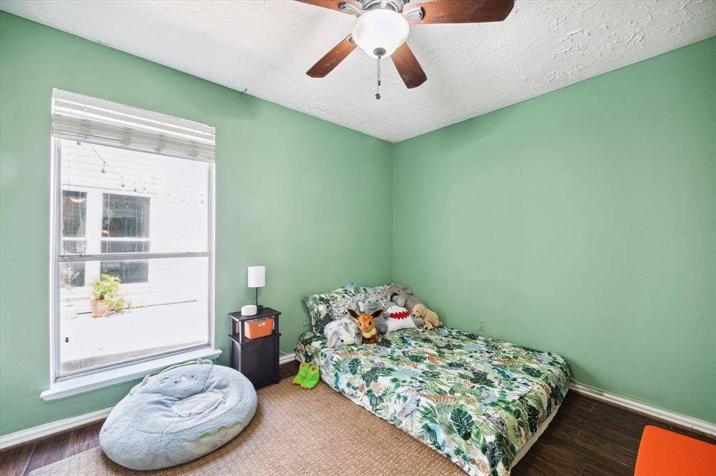One of two secondary bedrooms with a generous closet