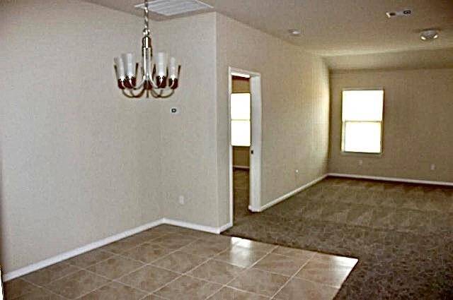 Dining room with tile flooring