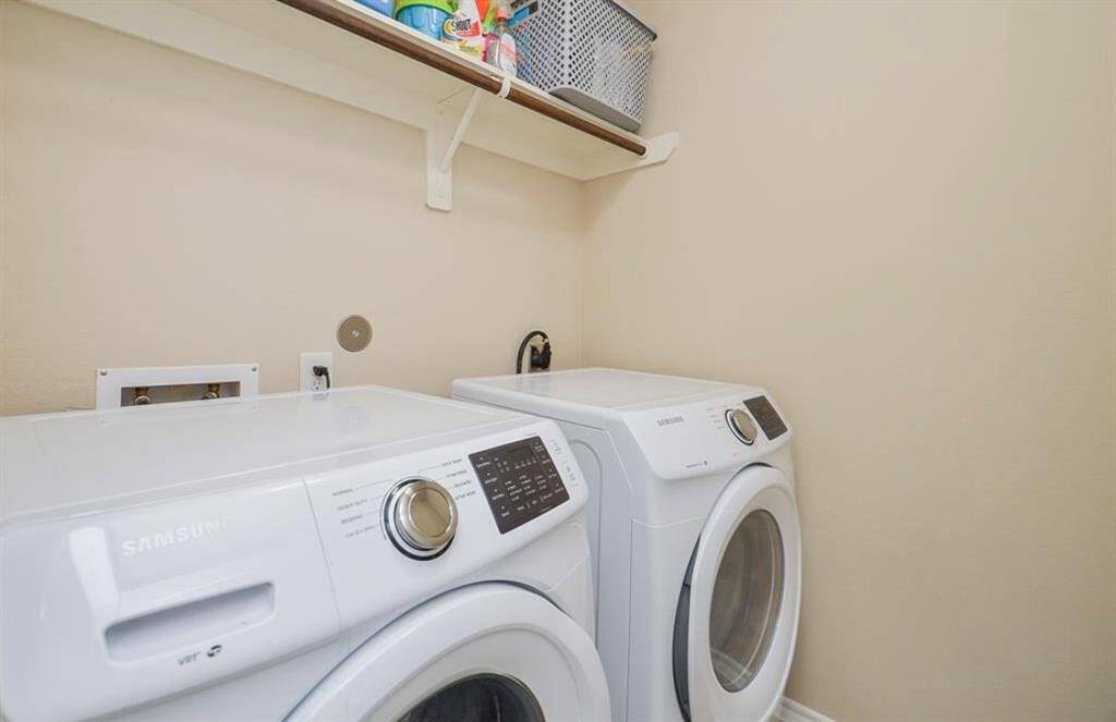 Laundry room in home. Room to hang dry clothes.