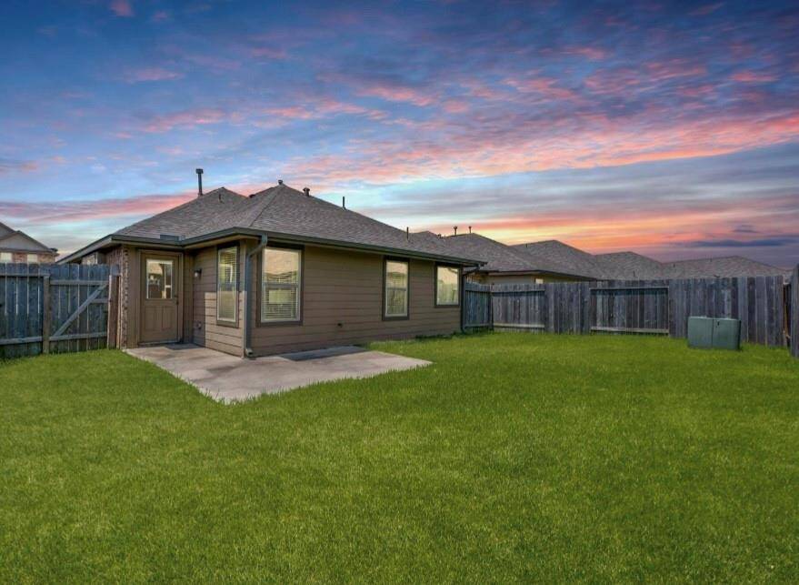Great back patio and large yard. Room for play.