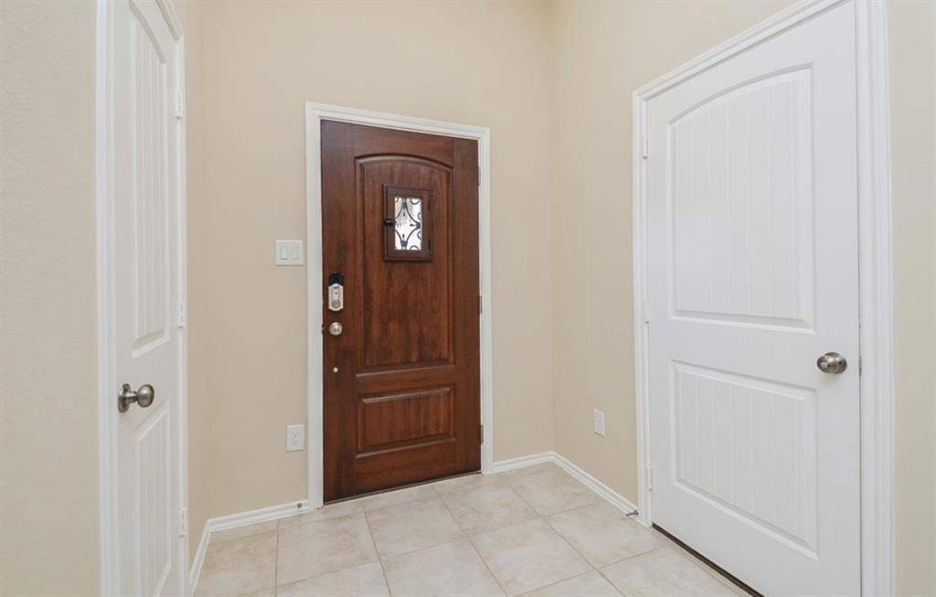 Upgraded Wood door.