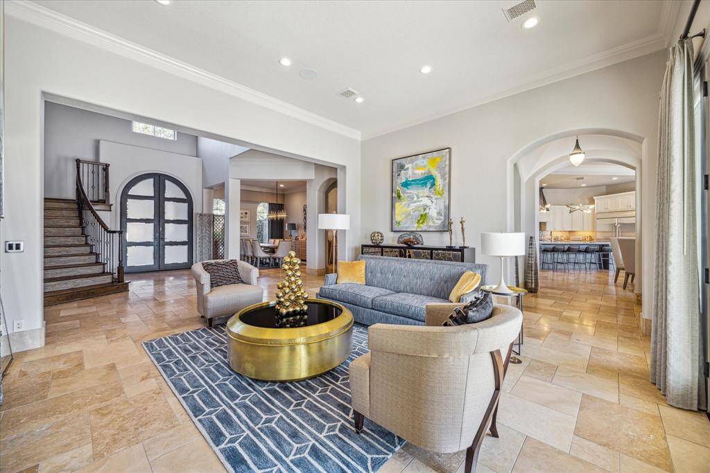 Another view of the formal living room located off the entryway.