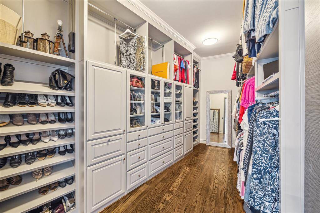 Her custom built master closet located off the master bath