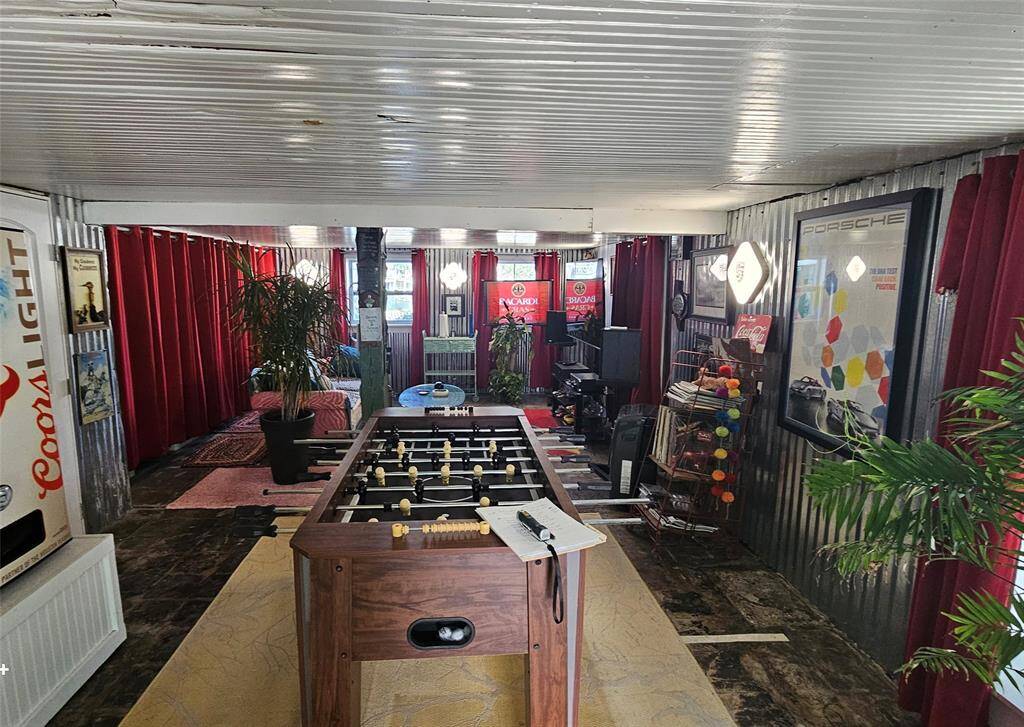 Go down to the 1st floor to the "Man Cave" to play Foosball or Watch the game with your friends!