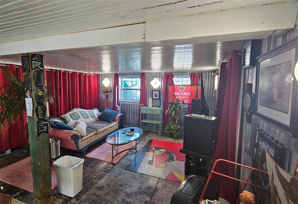Storage Shelves behind the Red Curtains also!! There is also a half bath in the "Man Cave"