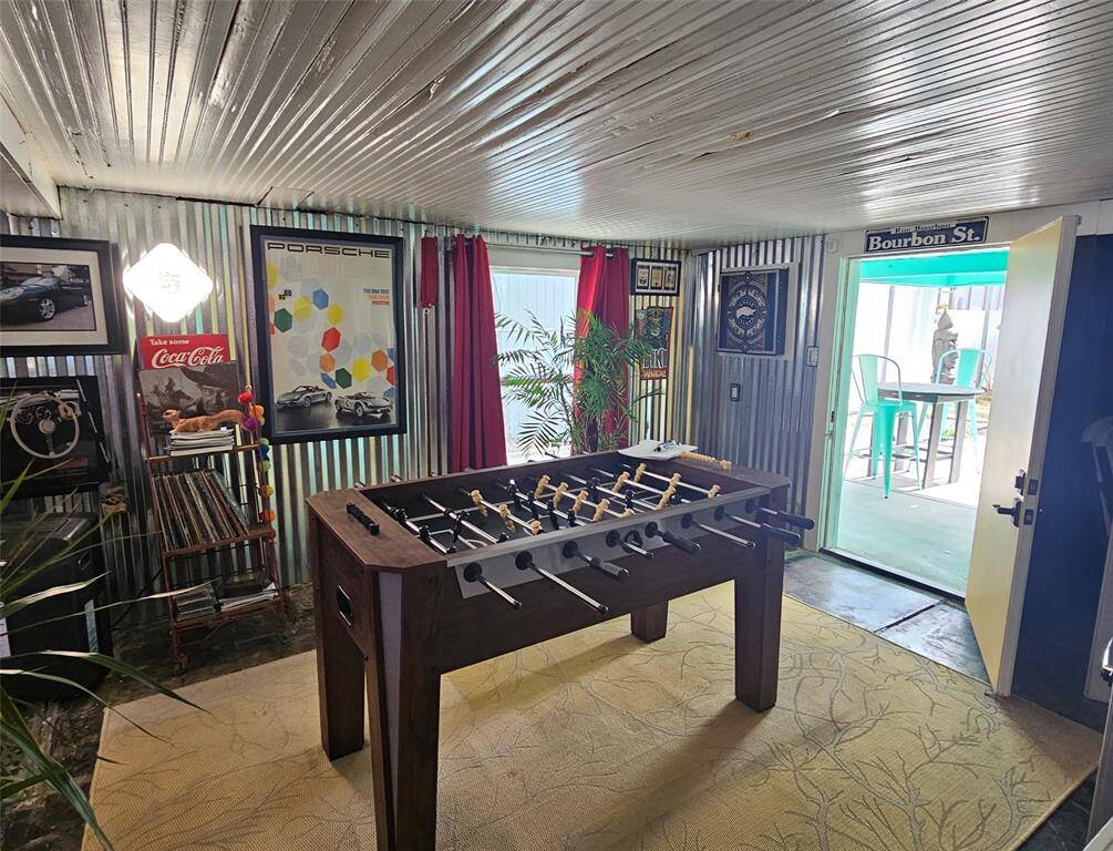 Relaxing "Man Cave" with a door leading to the bottom deck!