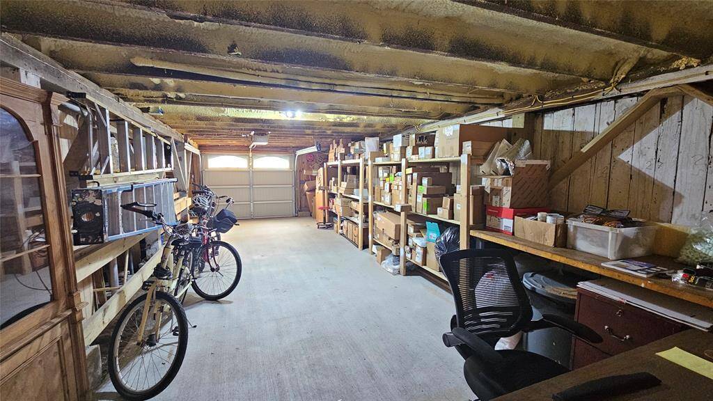 On the other side of the Man Cave is the Garage with Ample Space for your Stuff!