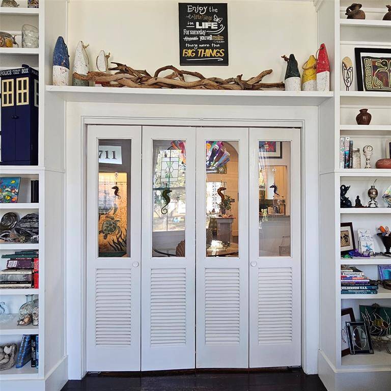 Custom Built Bifold Doors leading to the Dining Room!