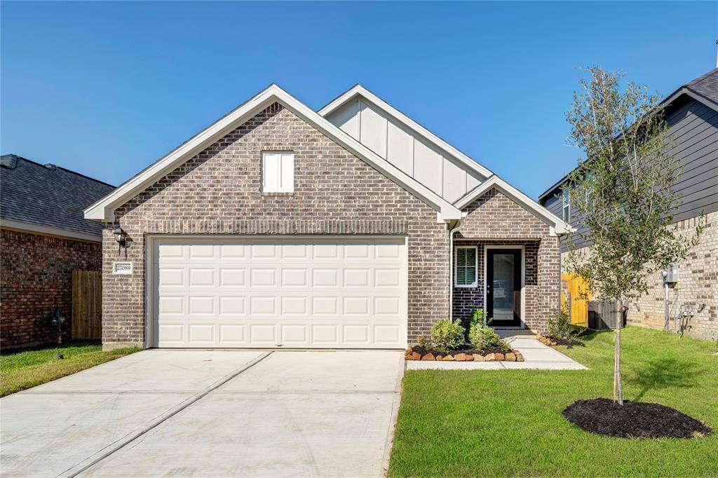 Home under construction. Similar elevation. Sample photo used for illustrative purposes only. Home to feature siding and brick front exterior. Upgrades, selection, brick, siding and colors will vary.