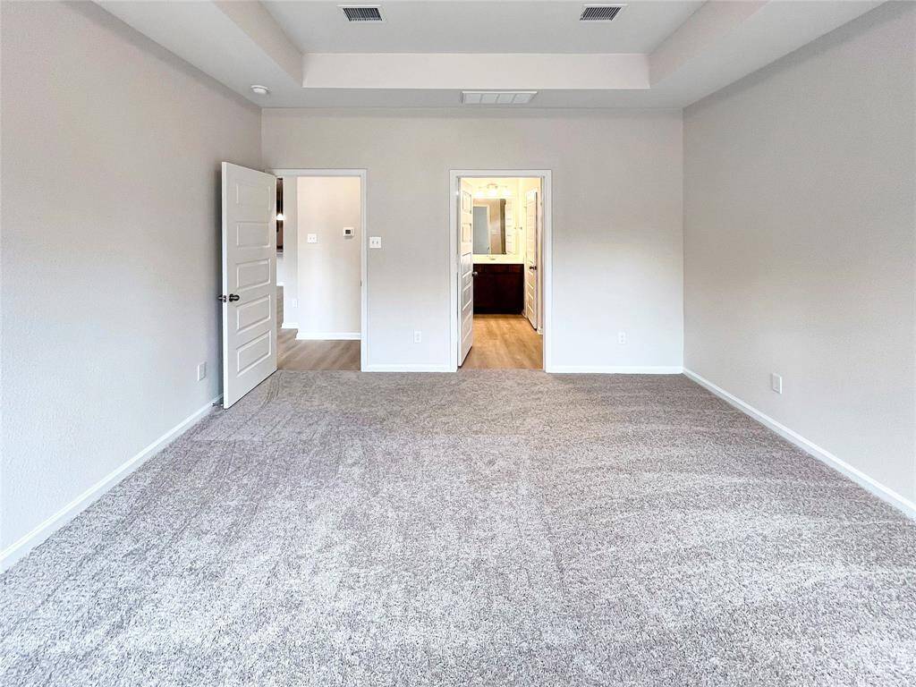 The Cardinal II- Primary Bedroom. Home under construction. Sample floor plan photo used for illustrative purposes only. Upgrades, selections options, windows and colors may vary.