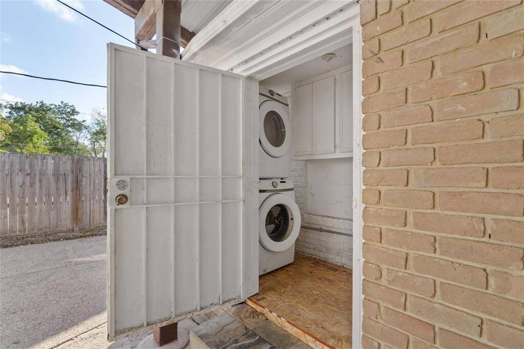 Laundry attached to the main house on exterior back side