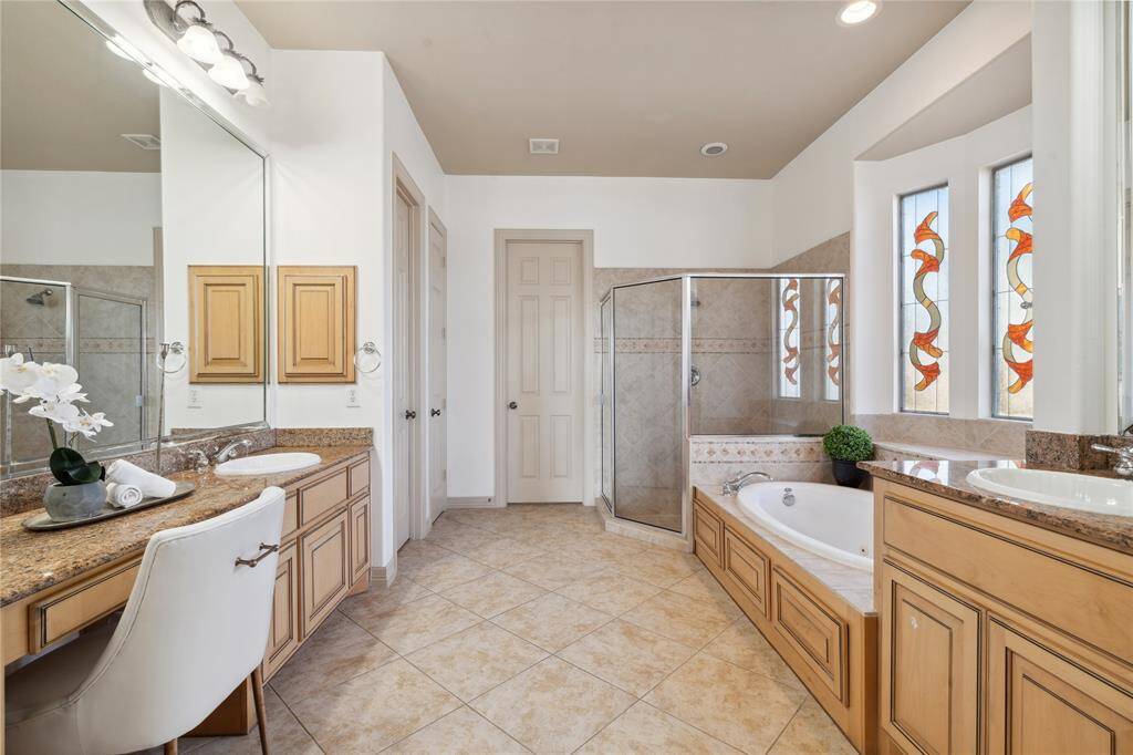 A retreat in your home—a primary bath designed for ultimate comfort and modern living.
