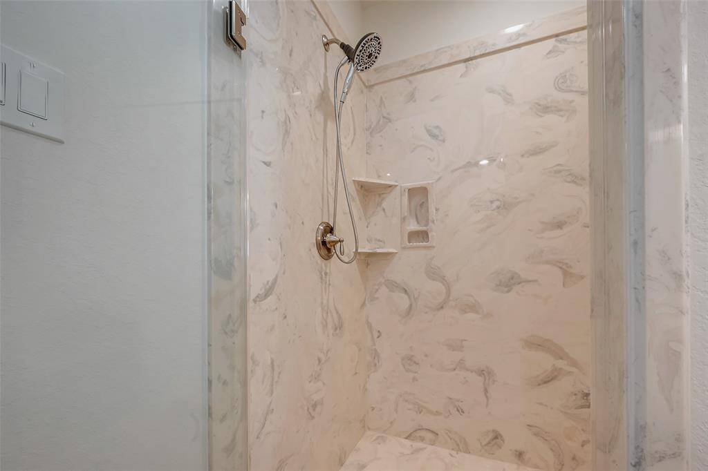 Full ensuite bathroom with walk-in shower for bedroom # 2.