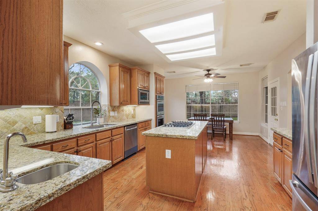 The kitchen and breakfast nook are seamlessly connected.