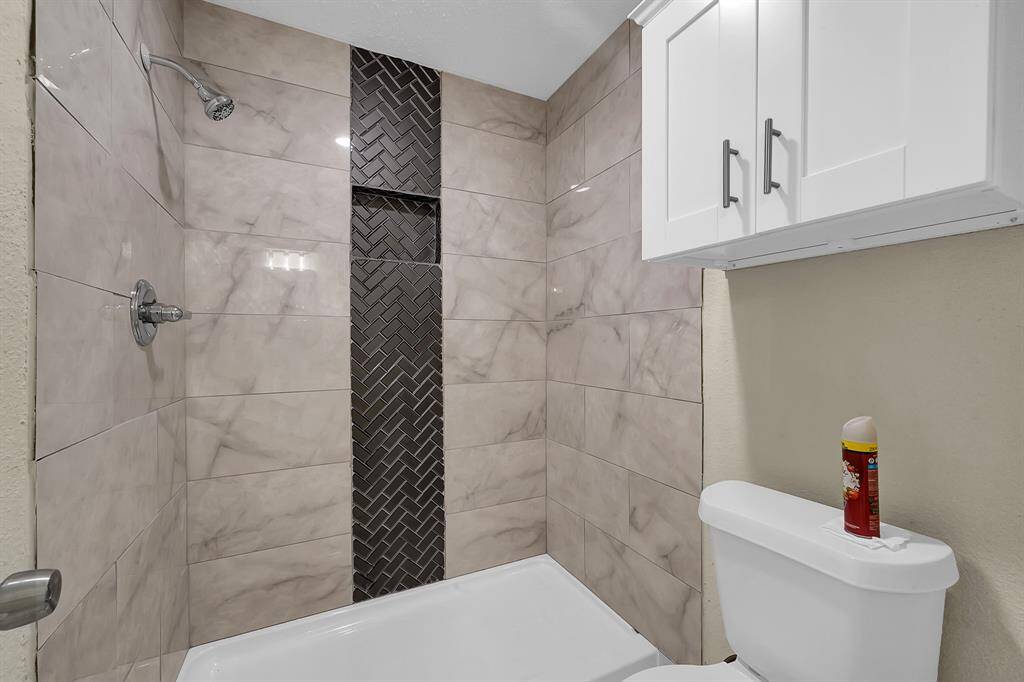 His and her sinks with modern and neutral finishes .