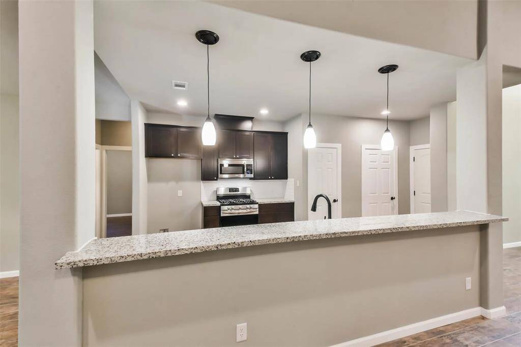 oversized long kitchen island with the breakfast