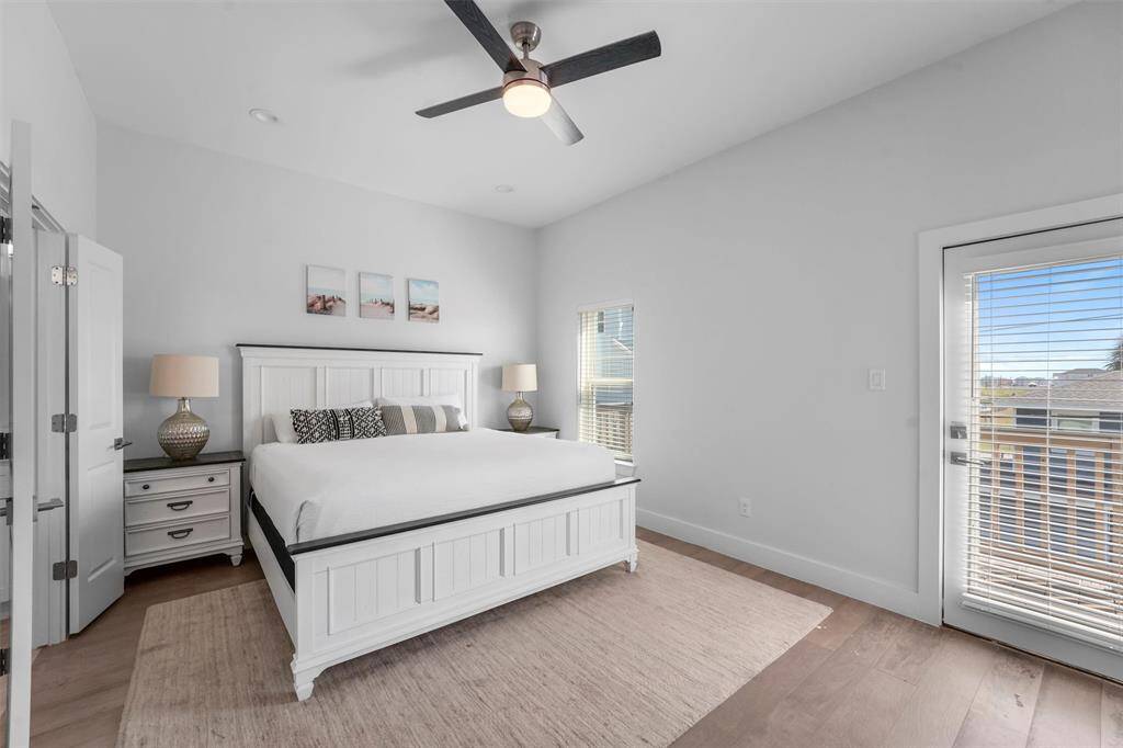 This inviting primary suite is a true retreat, featuring a bright and airy design, high ceilings, and a luxurious en-suite bathroom. Step out onto your private back balcony for a quiet escape and enjoy the peaceful coastal breeze.