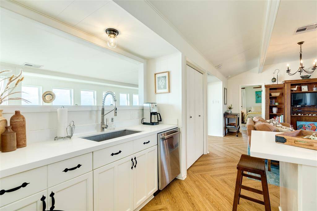 Kitchen overlooks the den and has views of the Gulf