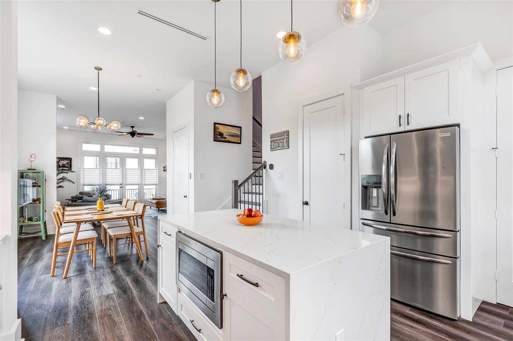 Durable LVP flooring and ALL appliances stay.