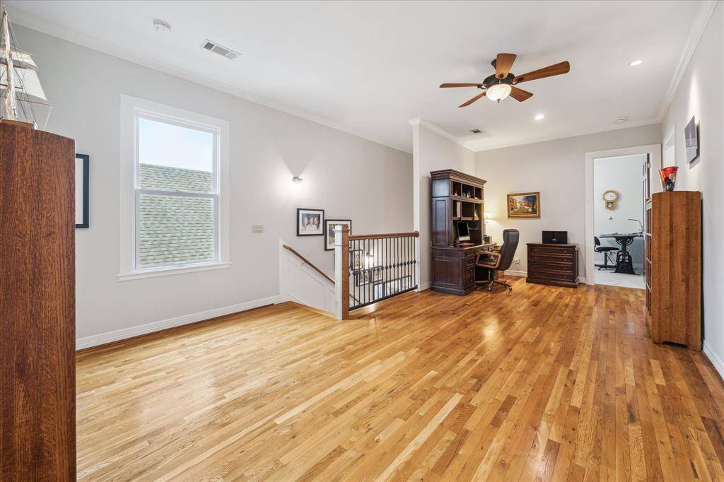 The second floor features a versatile space that can easily be used as a home office and game room, or any other purpose to suit your needs.