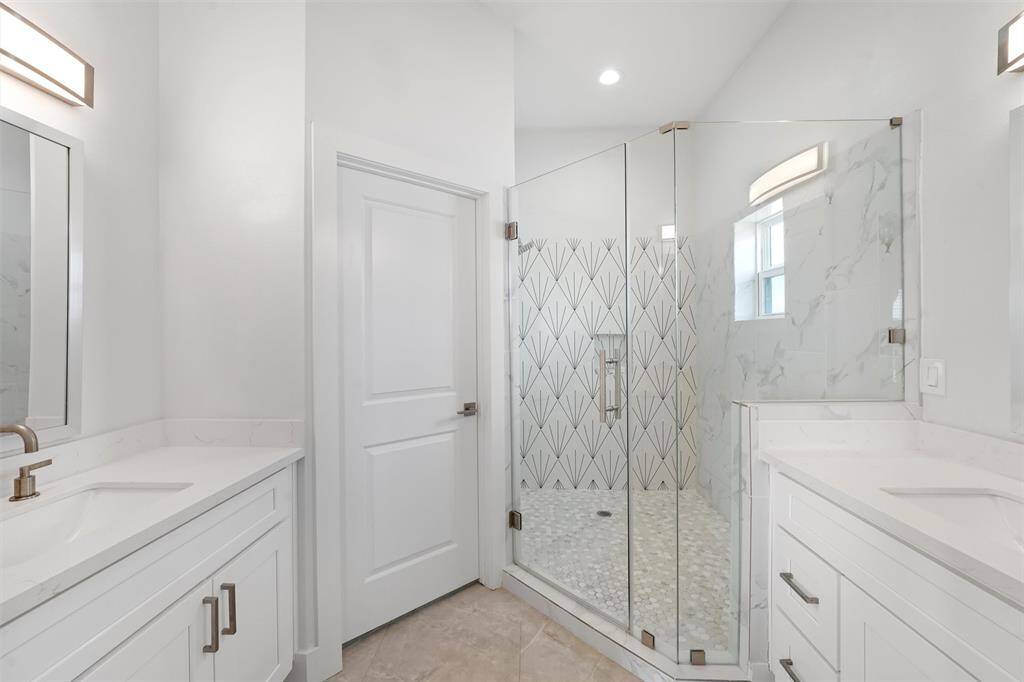 The clean, coastal aesthetic creates a spa-like retreat in the comfort of your own home.