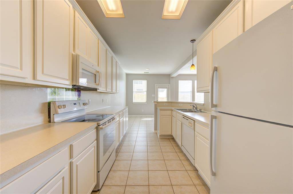 Refrigerator stays with the home.