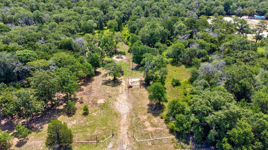 Aerial view of 5-acre tract that is partially cleared.