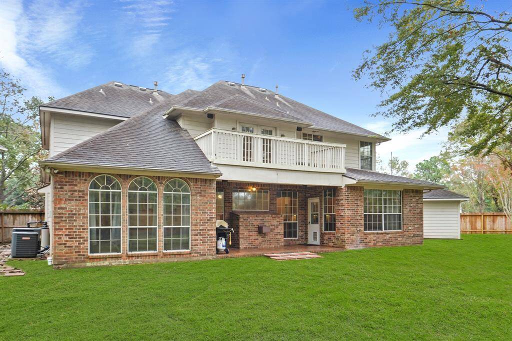 This HUGE backyard is definitely not lacking on green space! Featuring a covered patio, beautiful trees and a lush lawn, you'll have plenty of space to create your own paradise!