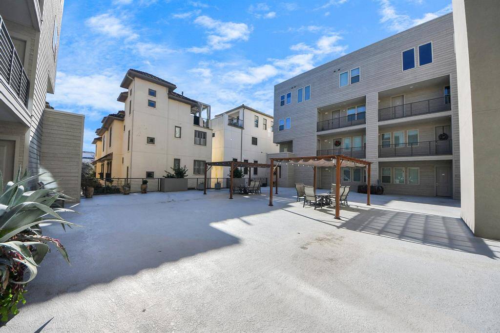 Courtyard featuring a two pergolas with outdoor seating and Ideal for relaxation.