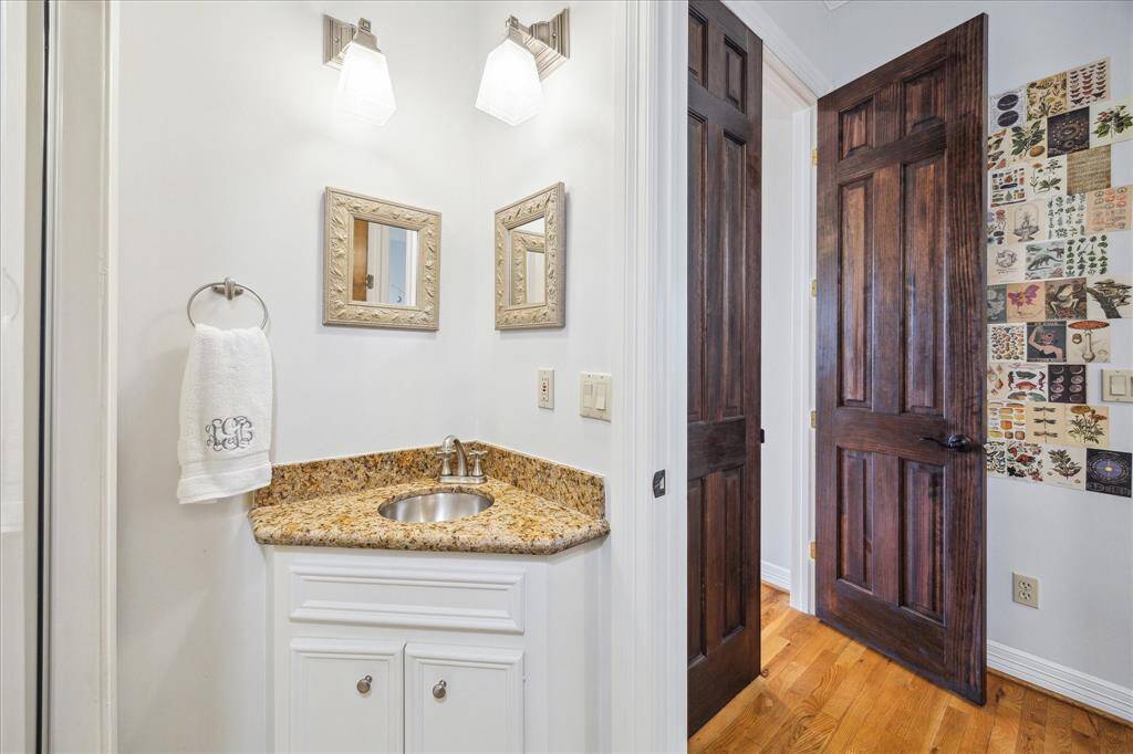 The ensuite bath is thoughtfully tucked in the corner near the entrance to Bedroom #4.