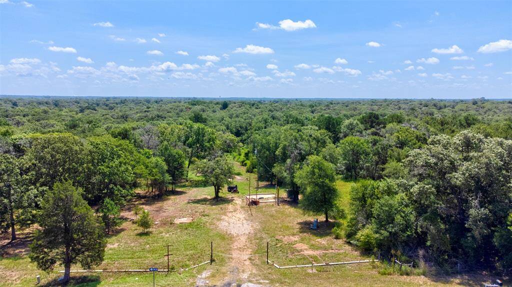 5-acre tract on Highway 6 with frontage and easy access from both directions.