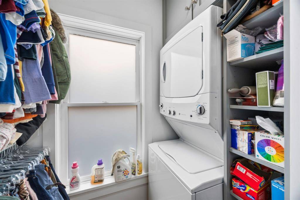 Washer and dryer inside unit.