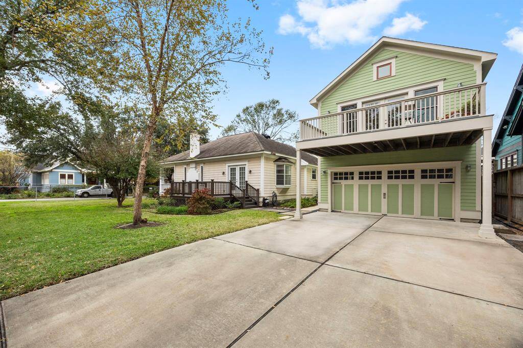 The garage apartment porch serves as an extension of the garage for additional covered parking.