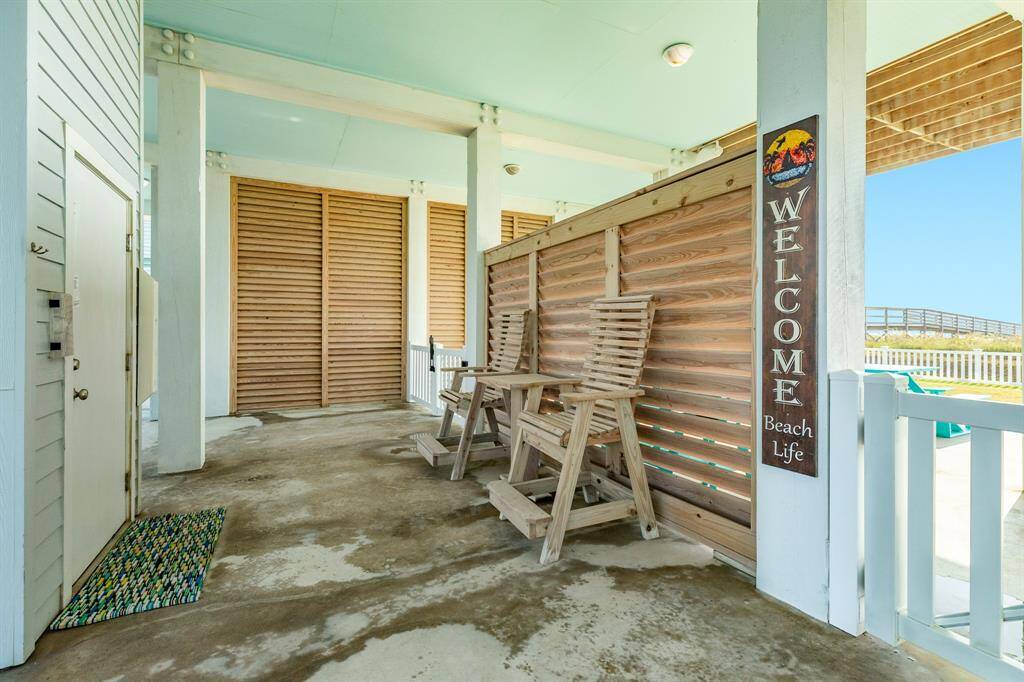 Louvered 'wind break' panel creates a nice backdrop to the elevator opening.