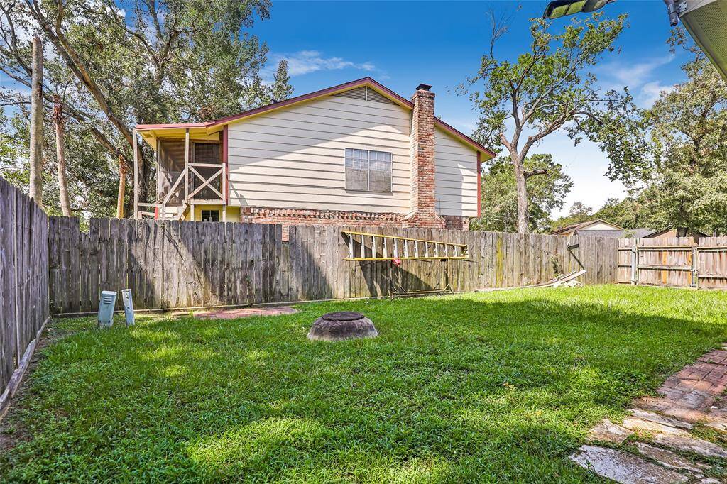 Backyard and side of detached garage