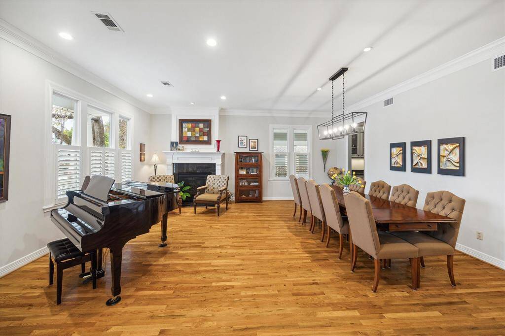 Step inside and be welcomed by beautiful wood floors in the bright and airy living and dining areas, creating an inviting space ideal for both relaxation and entertaining.