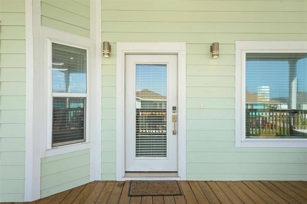 This charming entryway leads into a bright, open home designed for comfort and relaxation.