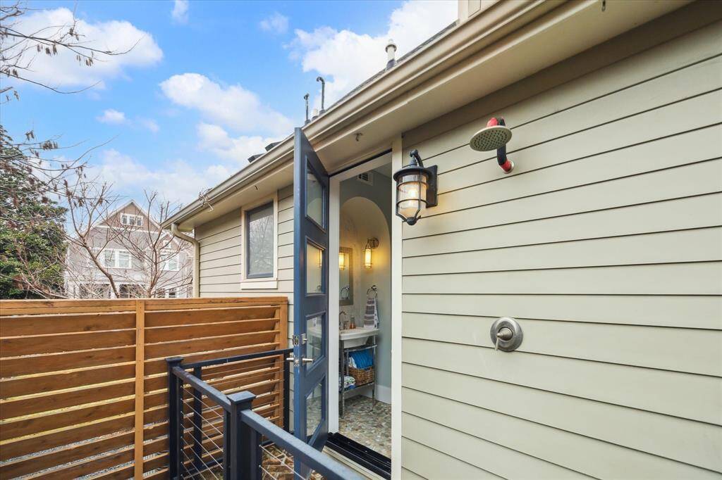 Convenient access from the pool leads directly into the pool house bath located on the left side of the pool house, making it easy for guests to freshen up after a swim and includes an outdoor shower to rinse off.