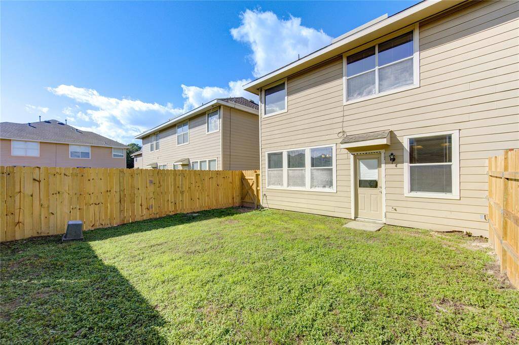 Spacious backyard with new fence (replaced in Nov 2024).