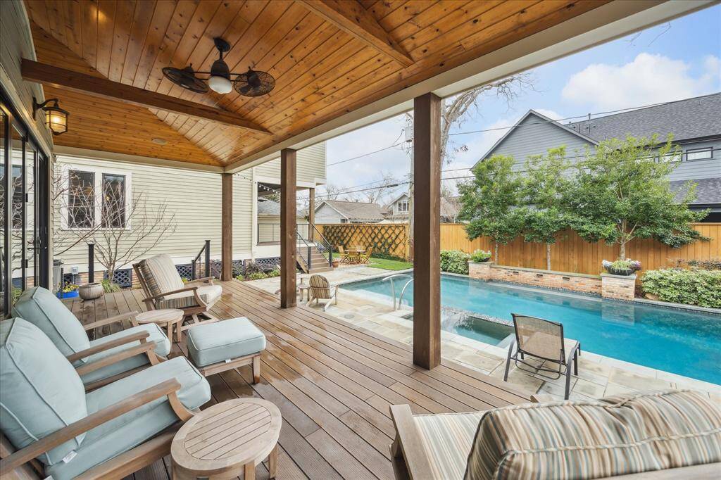 The pool house deck, featuring a beautiful wood ceiling provides a fantastic seating area with a fantastic view of the pool. Ceiling fans adds additional comfort during those hot months.