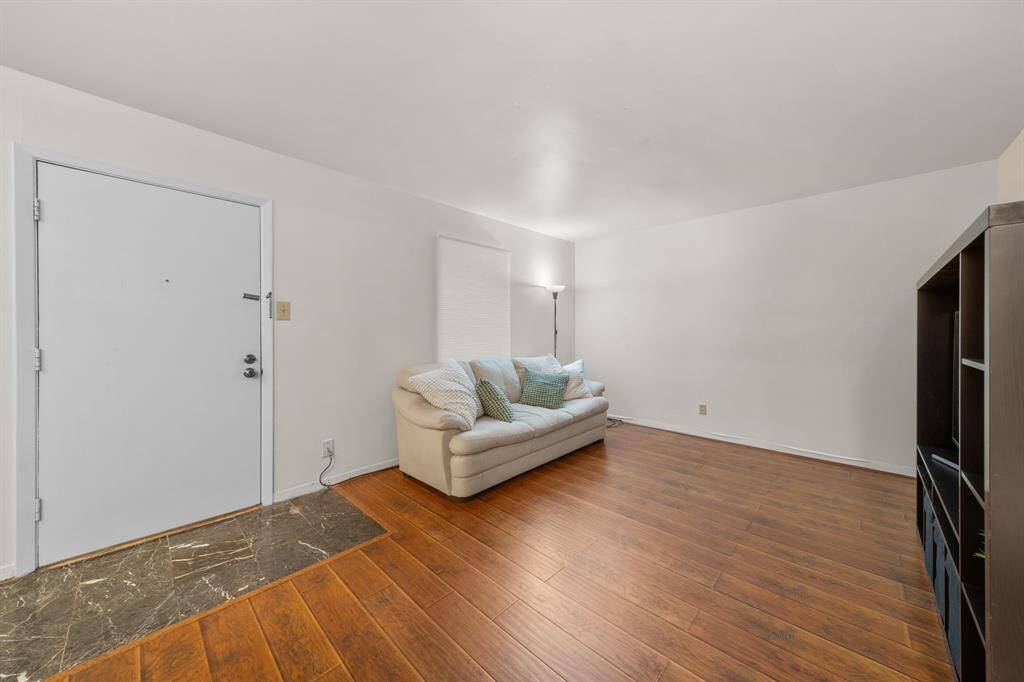 View of living room looking towards front door