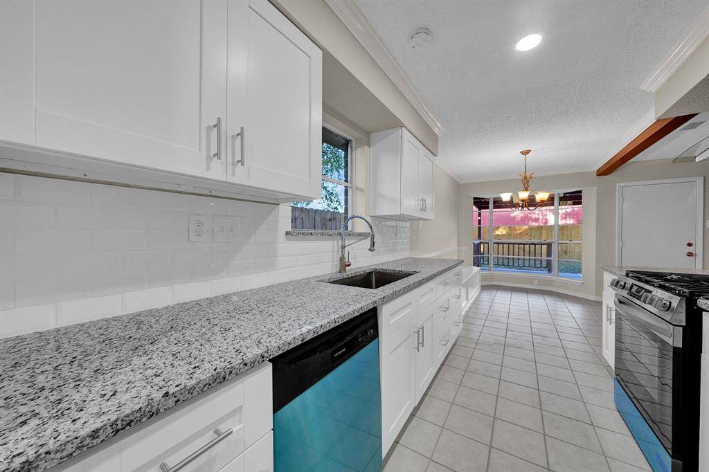 New appliances include: Dishwasher, stove , over the stove vent hood , and deep kitchen sink