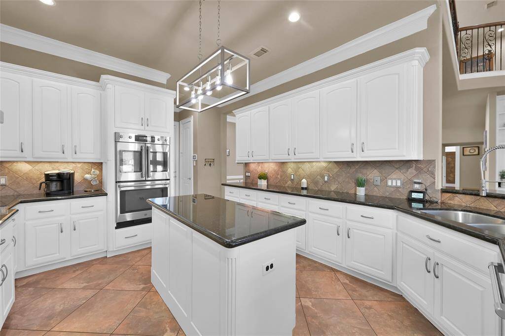 Double ovens, one with a French door