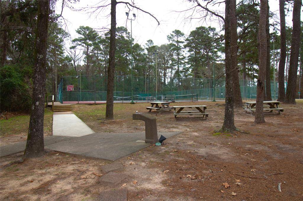 Enjoy active living with tennis and pickleball courts, plus a charming picnic area with a water fountain.