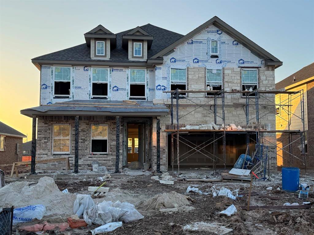 Two story home with 6 bedrooms, 4.5 baths, and 2 car garage.