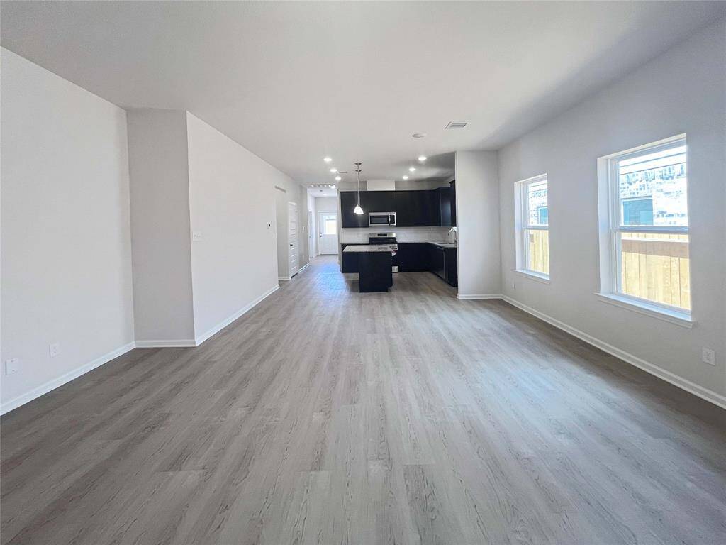 Family Room into Dining Area and Kitchen