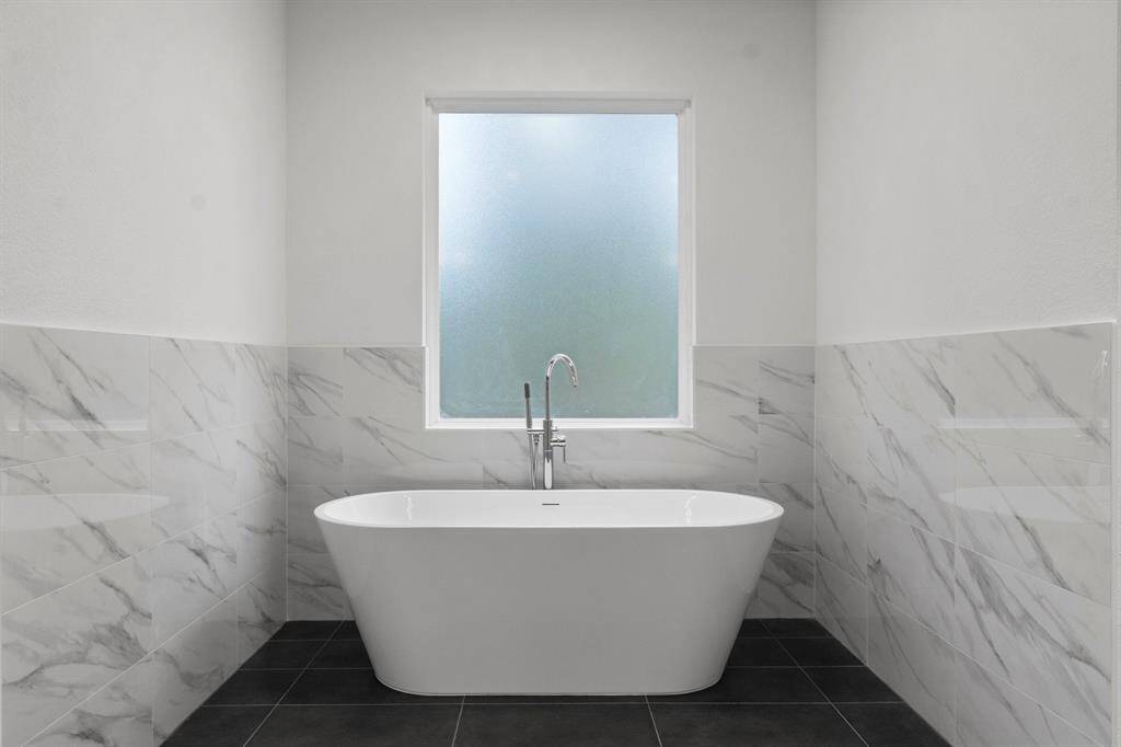 Imagine soaking in the bathtub with some wine after a long day!