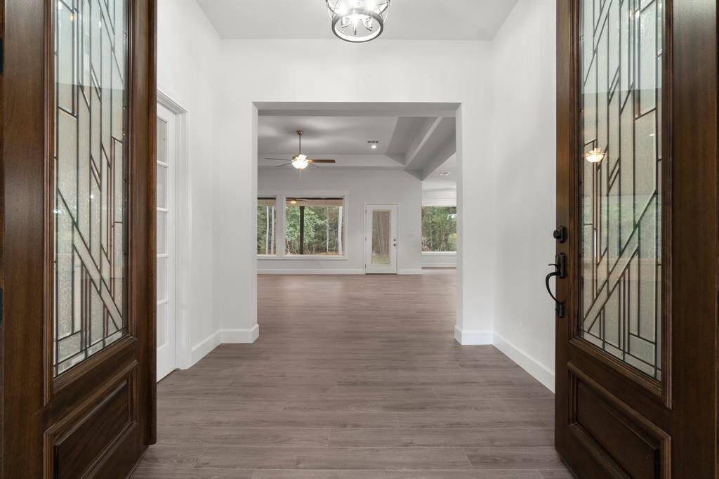 Greeted by a grand entry way/ foyer. Formal office off to your left, living room straight ahead.