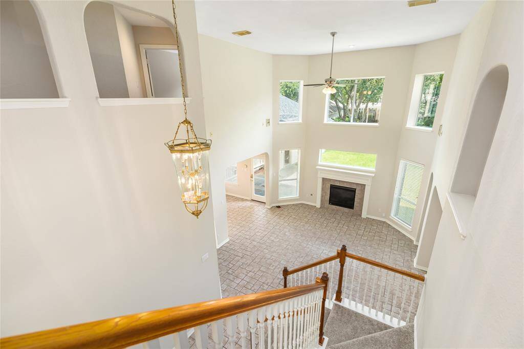 Birds-eye view of the living room from the stairway